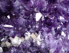 Polished and natural crystals, spheres, freeforms and pebbles of  Amethyst